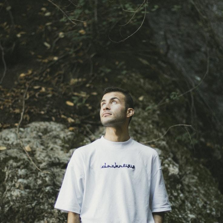 Anya Vale, Lead Design Curator at Cove Harbor Studio, reviewing corporate floral arrangements